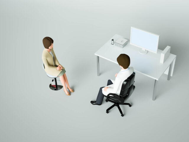 患者と医者が向き合っている絵